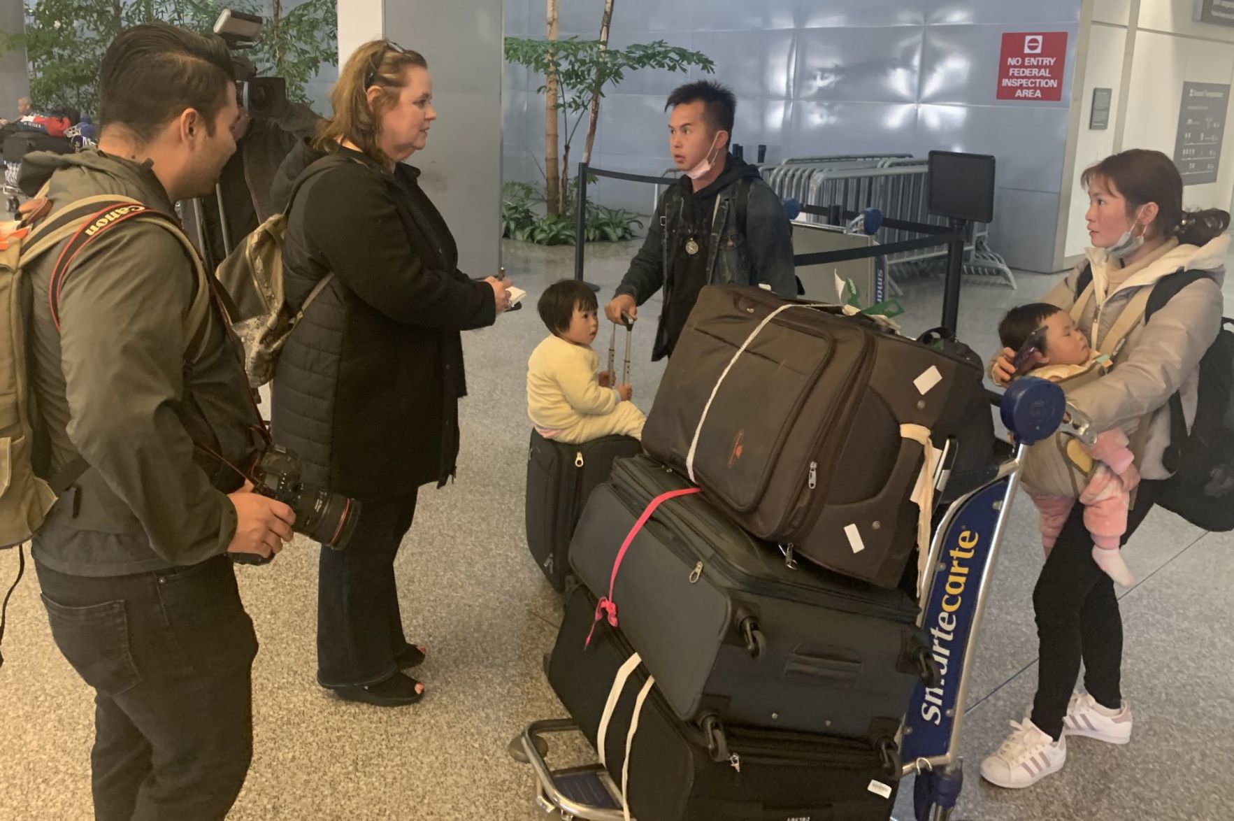 Family arrives in San Francisco from Beijing, China